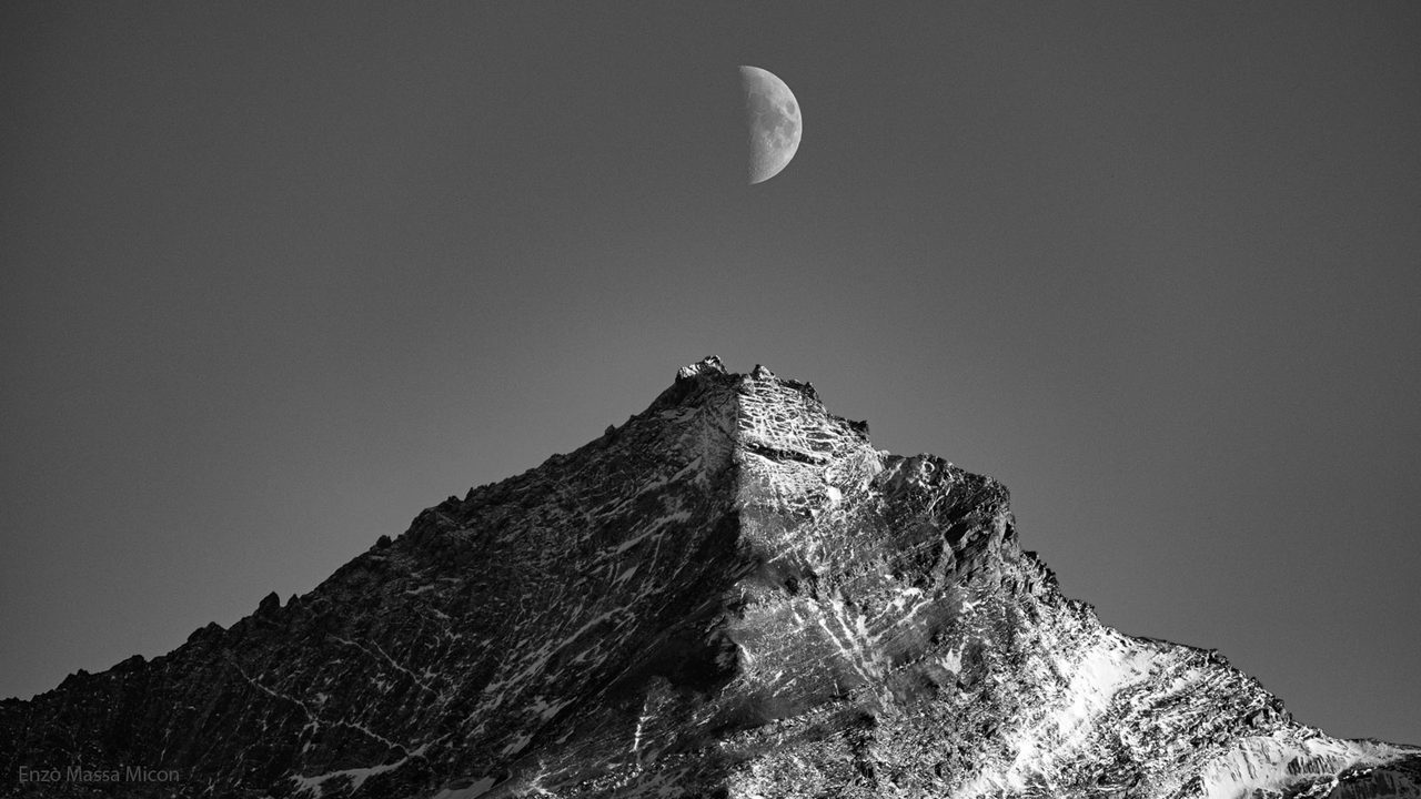 Moon over mountain landscape